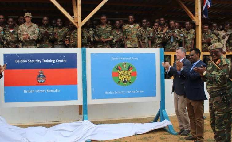 UK opens army training facility for Somali forces.